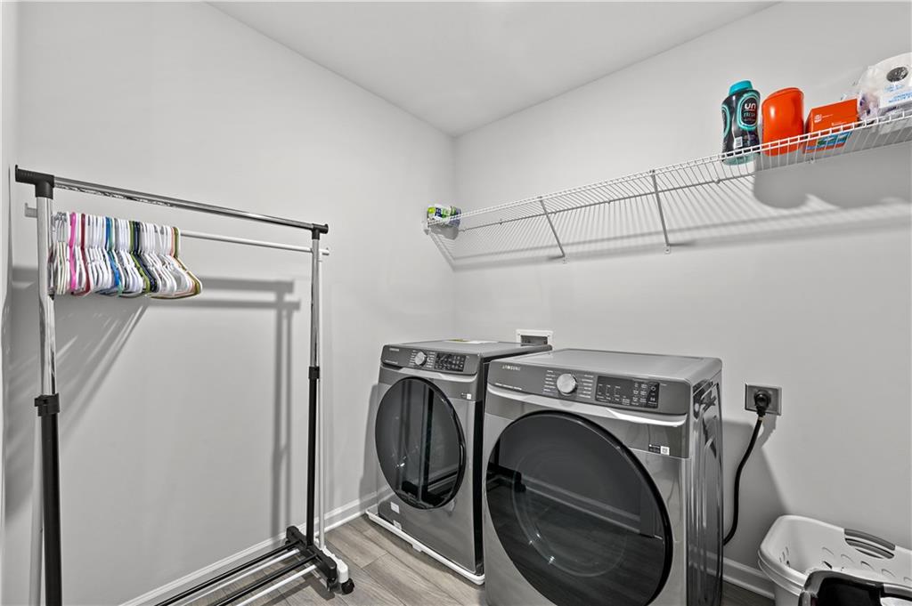 68 Suwannee Way Jefferson, GA 30549 - Photo 25 of 28 a utility room with dryer and washer