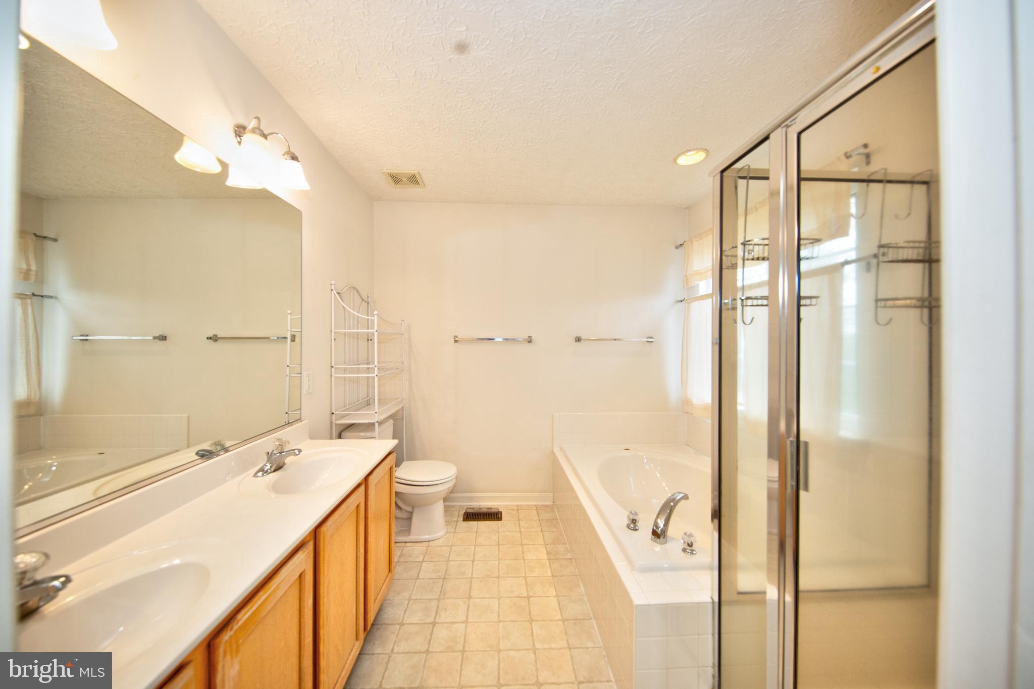 567 Beards Hill Road Aberdeen, MD 21001 - Photo 23 of 43 Primary bathroom w/ double vanity & soaking tub