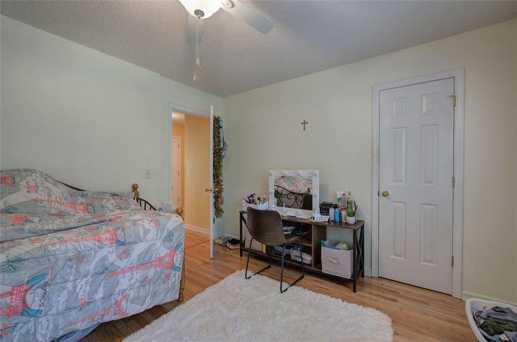 915 Oak Grove Road Carrollton, GA 30117 - Photo 25 of 57 a bedroom with a bed and a window