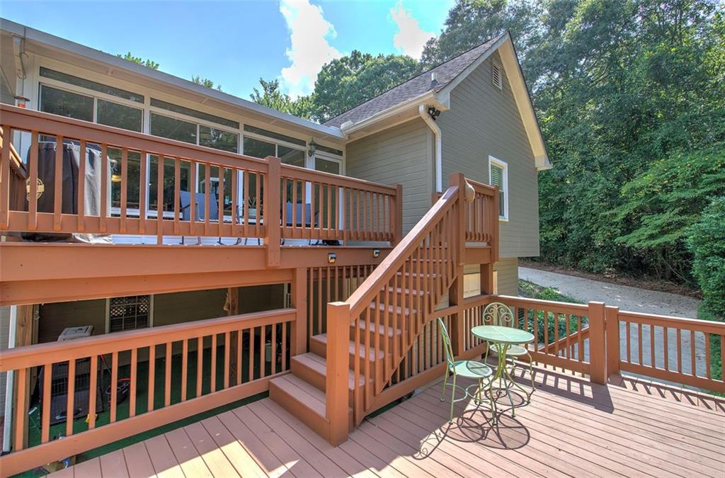 915 Oak Grove Road Carrollton, GA 30117 - Photo 44 of 57 a view of a house with a deck