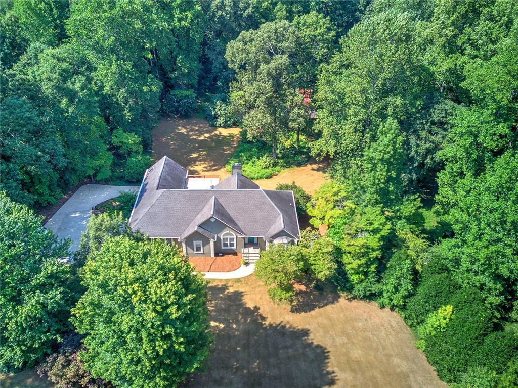 915 Oak Grove Road Carrollton, GA 30117 - Photo 55 of 57 an aerial view of a house with yard swimming pool and outdoor seating