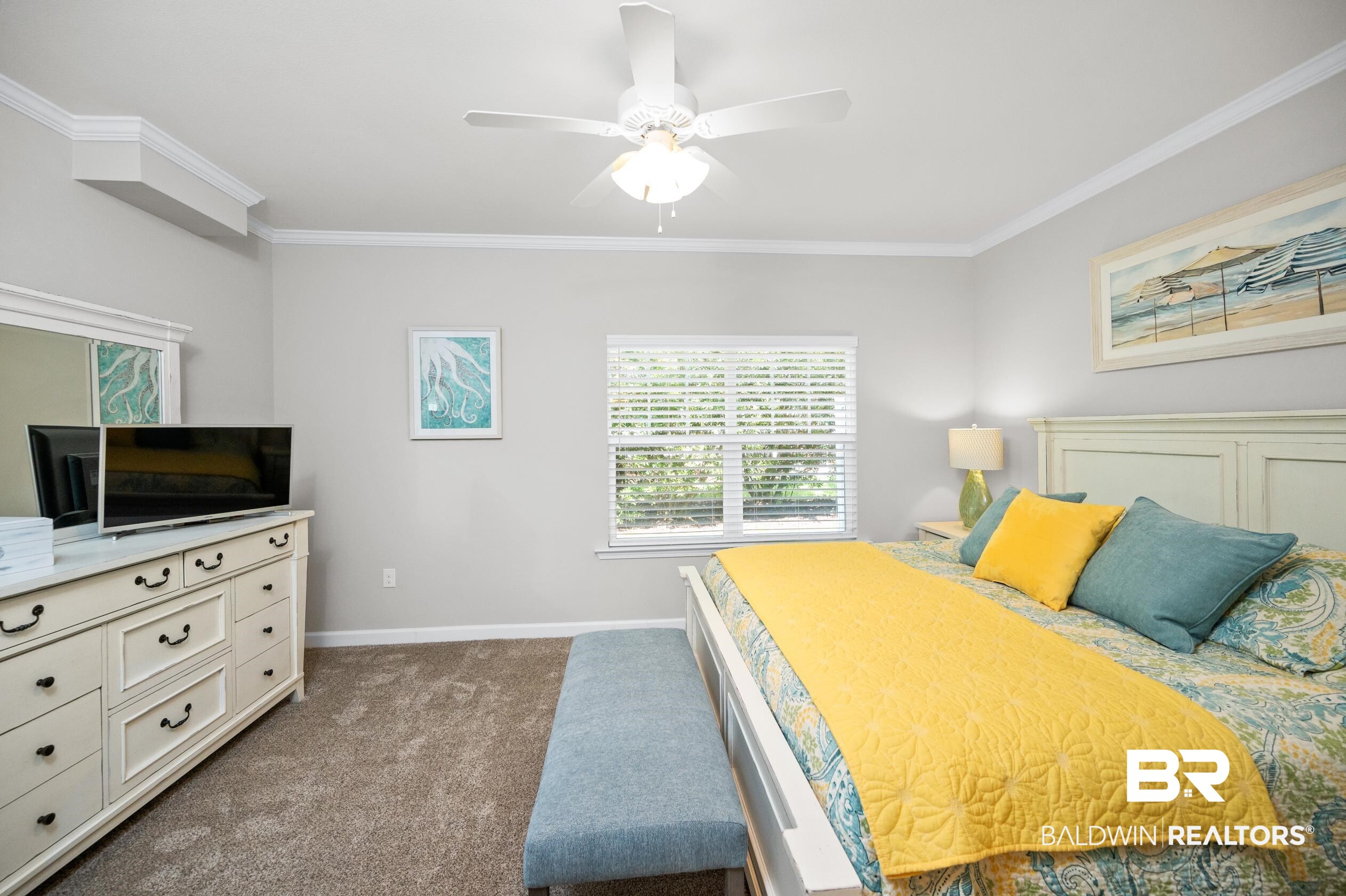 430 West Fort Morgan Road, Unit 1902 Gulf Shores, AL 36542 - Photo 19 of 59 Carpeted bedroom with crown molding and ceiling fan