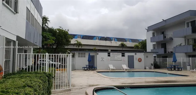 a swimming pool view with a outdoor space