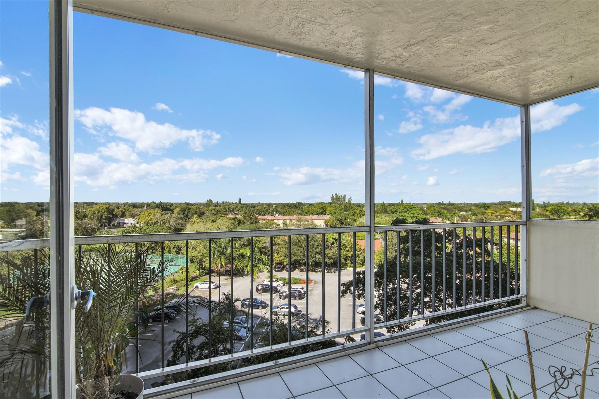 10777 West Sample Road, Unit 711 Coral Springs, FL 33065 - Photo 16 of 45 a view of ocean from a balcony