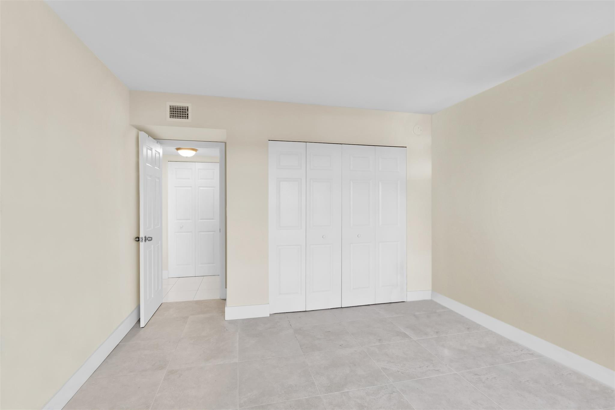 10777 West Sample Road, Unit 711 Coral Springs, FL 33065 - Photo 40 of 45 a view of an empty room