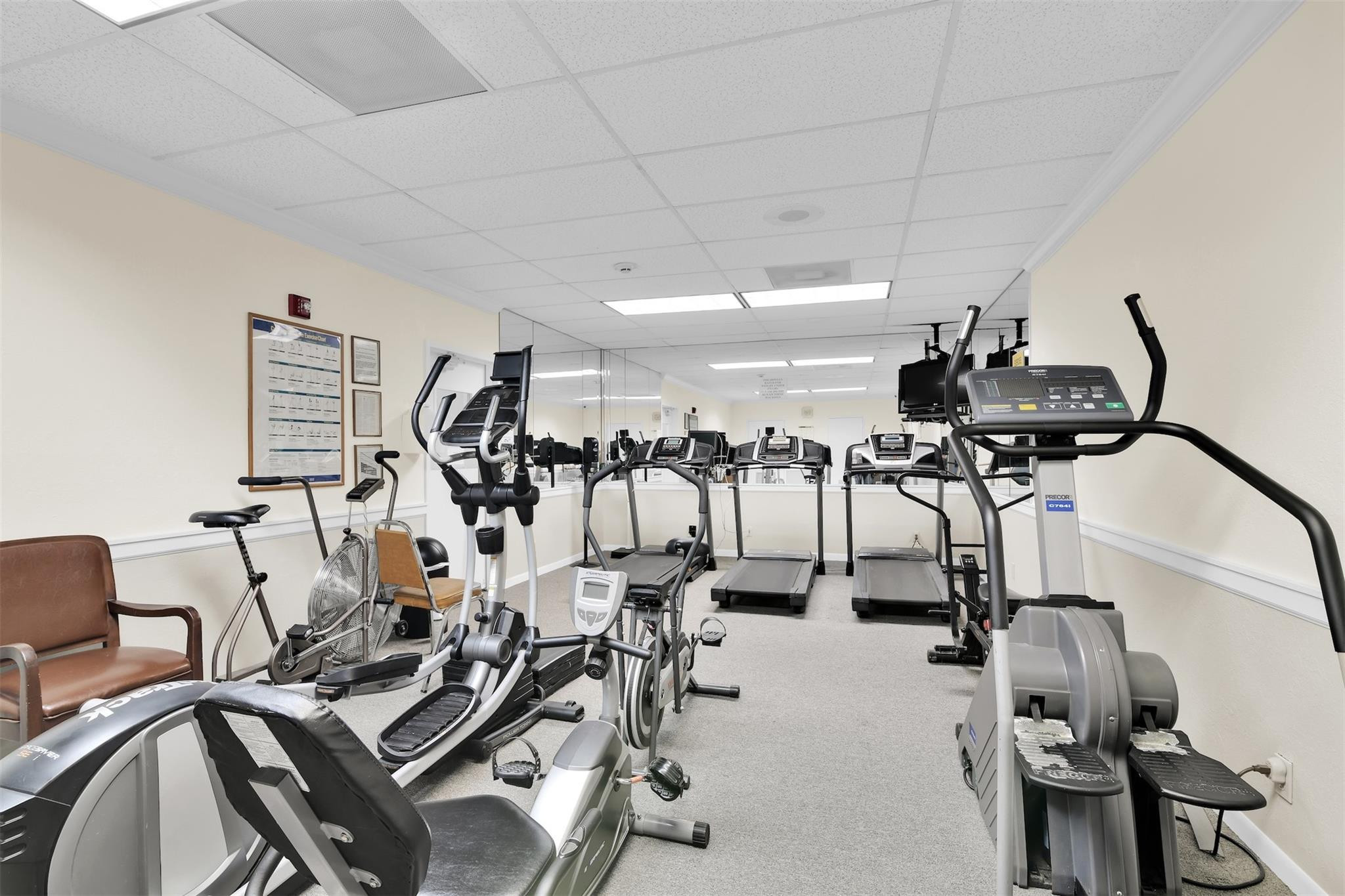 10777 West Sample Road, Unit 711 Coral Springs, FL 33065 - Photo 45 of 45 a view of a room with gym equipment