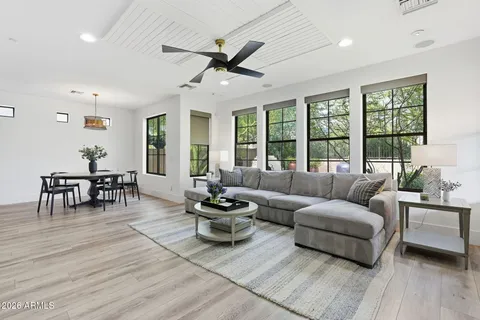 a spacious bedroom with a bed and furniture
