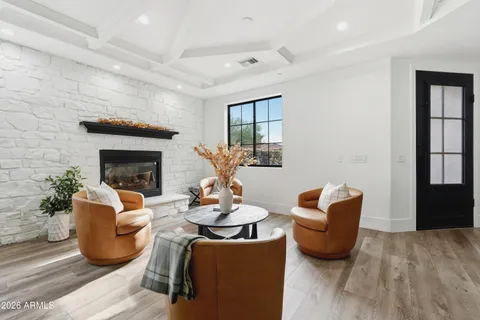 a living room with couches and a fireplace