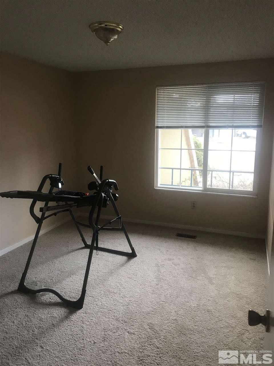 2430 Figoni Ranch Road Sparks, NV 89434 - Photo 5 of 7 a view of a room with gym equipment