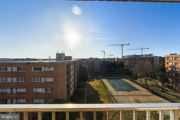 a view of a balcony with city view