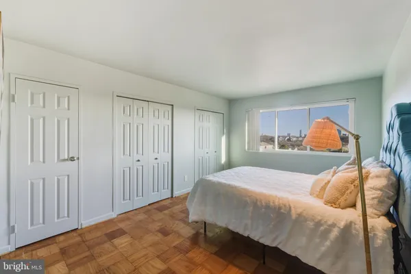 a view of washer and dryer with kitchen in the background