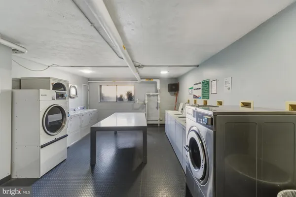 a view of a swimming pool with a lounge chairs