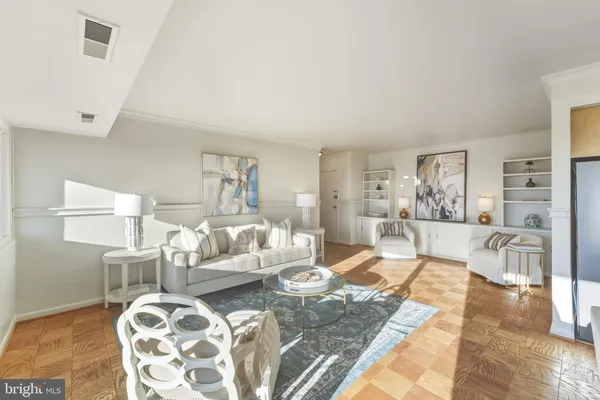 a living room with furniture and a couch