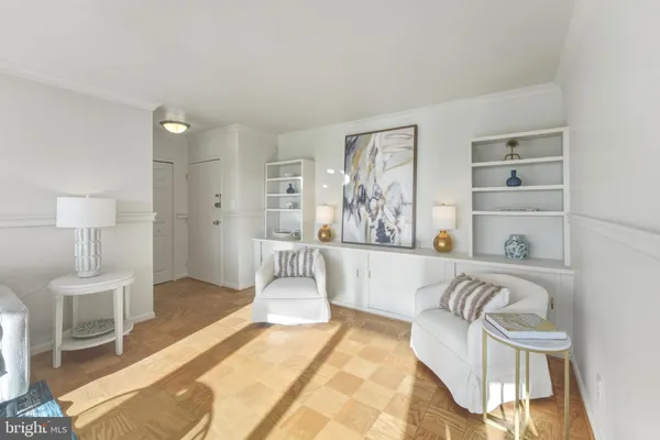 a kitchen with a stove a microwave and refrigerator