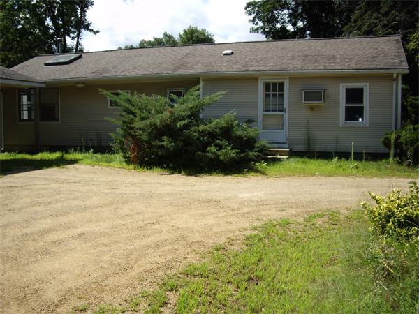 214 West Street Ware, MA 01082 - Photo 2 of 18 a front view of a house with garden