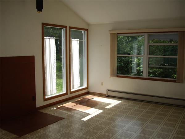 214 West Street Ware, MA 01082 - Photo 5 of 18 a view of a room that has a window in it