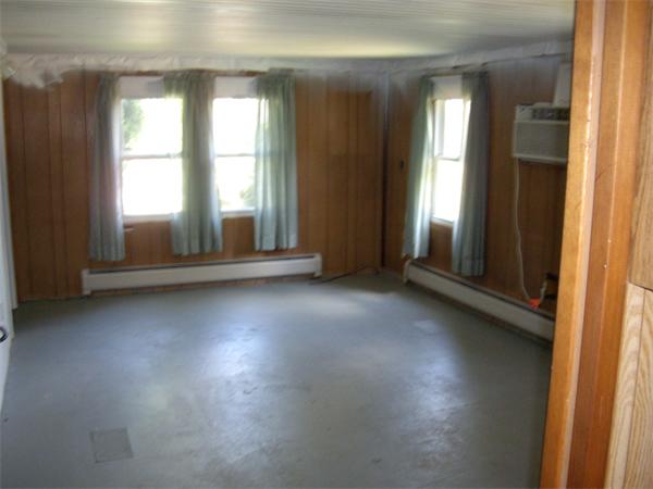 214 West Street Ware, MA 01082 - Photo 9 of 18 an empty room with windows