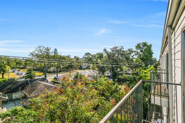 a view of a lake from a balcony