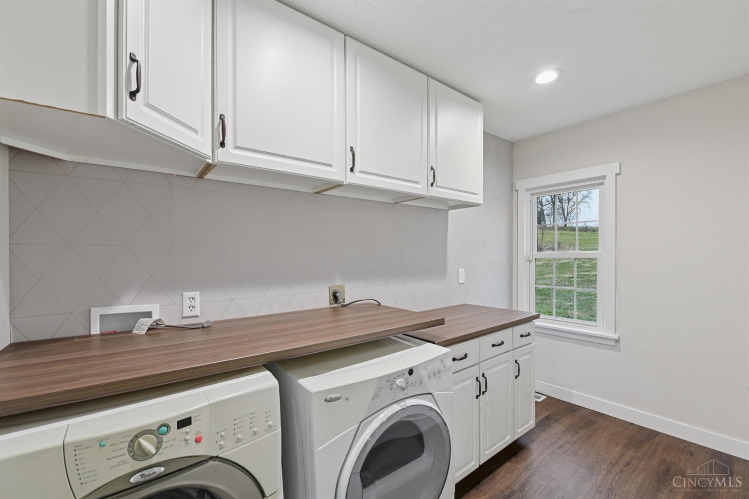 2545 Cliff Road North Bend, OH 45052 - Photo 22 of 55 First floor laundry provides convenience and ease with plenty of storage and counter space...doing laundry is a breeze!