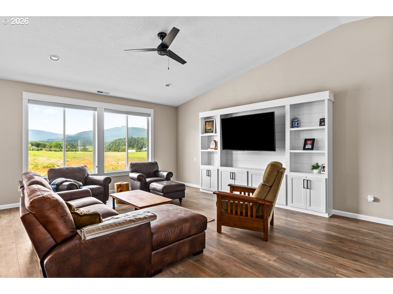 25850 Foster Road Monroe, OR 97456 - Photo 11 of 48 a living room with furniture and a flat screen tv