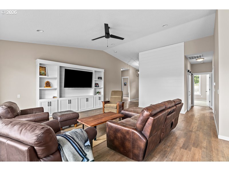 25850 Foster Road Monroe, OR 97456 - Photo 13 of 48 a living room with furniture and a flat screen tv