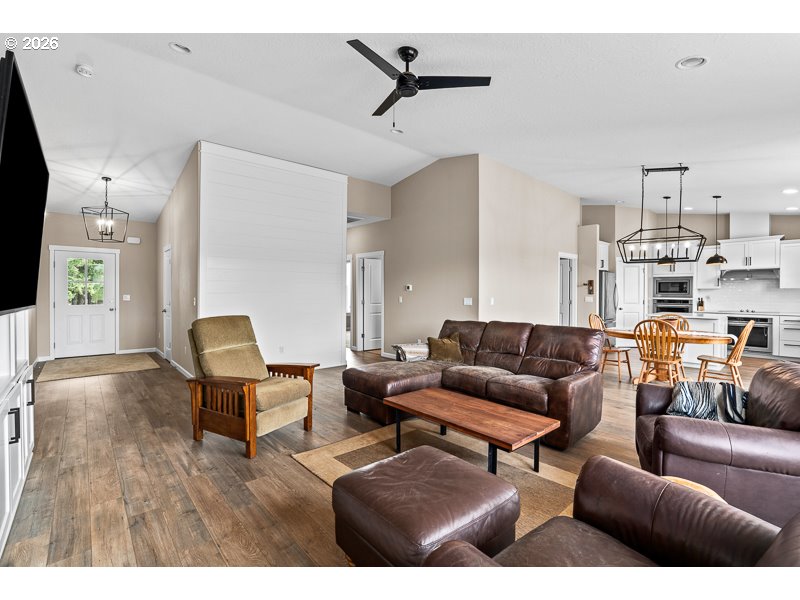 25850 Foster Road Monroe, OR 97456 - Photo 16 of 48 a living room with furniture and a wooden floor