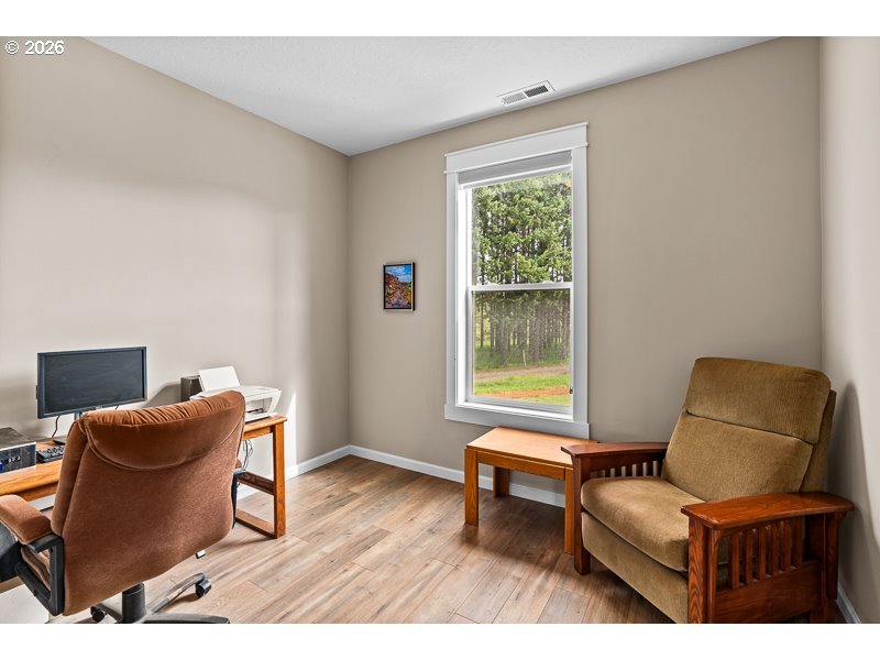 25850 Foster Road Monroe, OR 97456 - Photo 30 of 48 a living room with furniture and a window