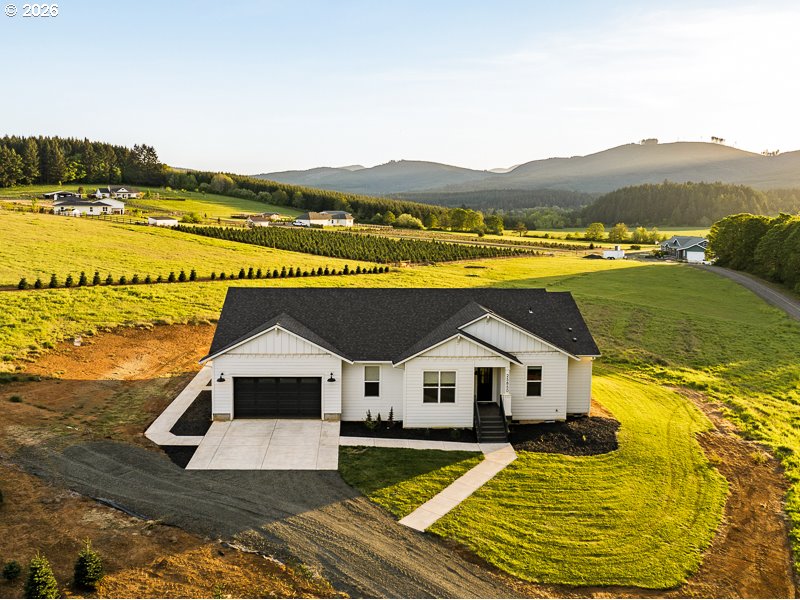 25850 Foster Road Monroe, OR 97456 - Photo 4 of 48 a view of a house with a ocean view