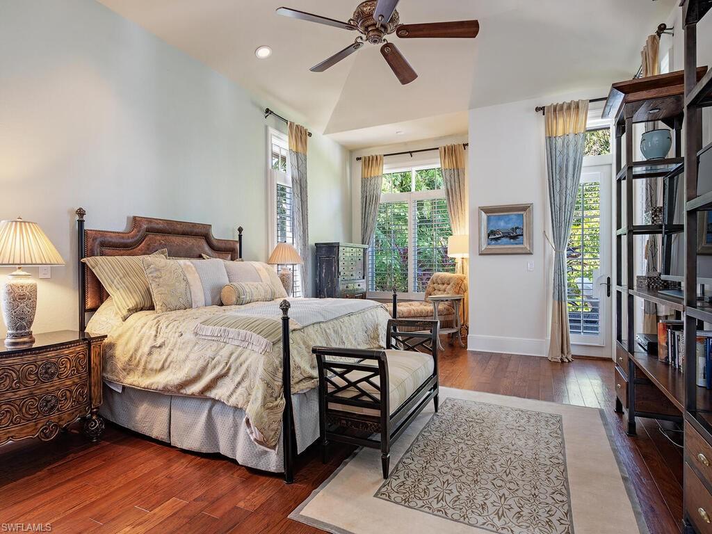 155 20th Avenue South Naples, FL 34102 - Photo 17 of 30 Bedroom featuring dark wood-style flooring, ceiling fan, access to exterior, and recessed lighting