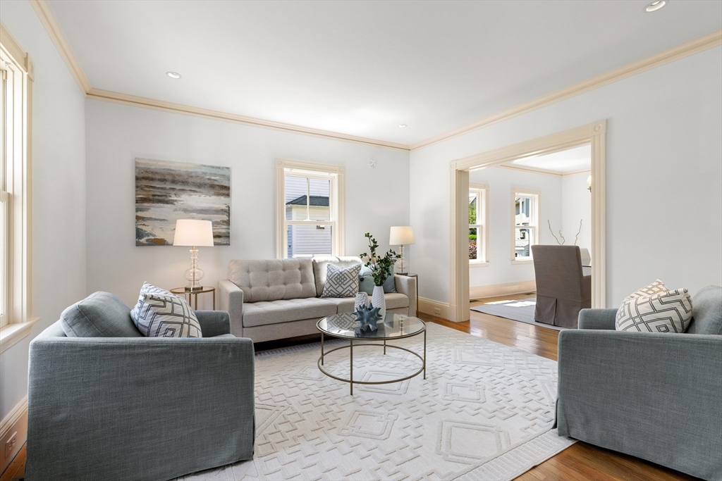 8 Jackson Court Lexington, MA 02421 - Photo 3 of 27 a living room with furniture and wooden floor