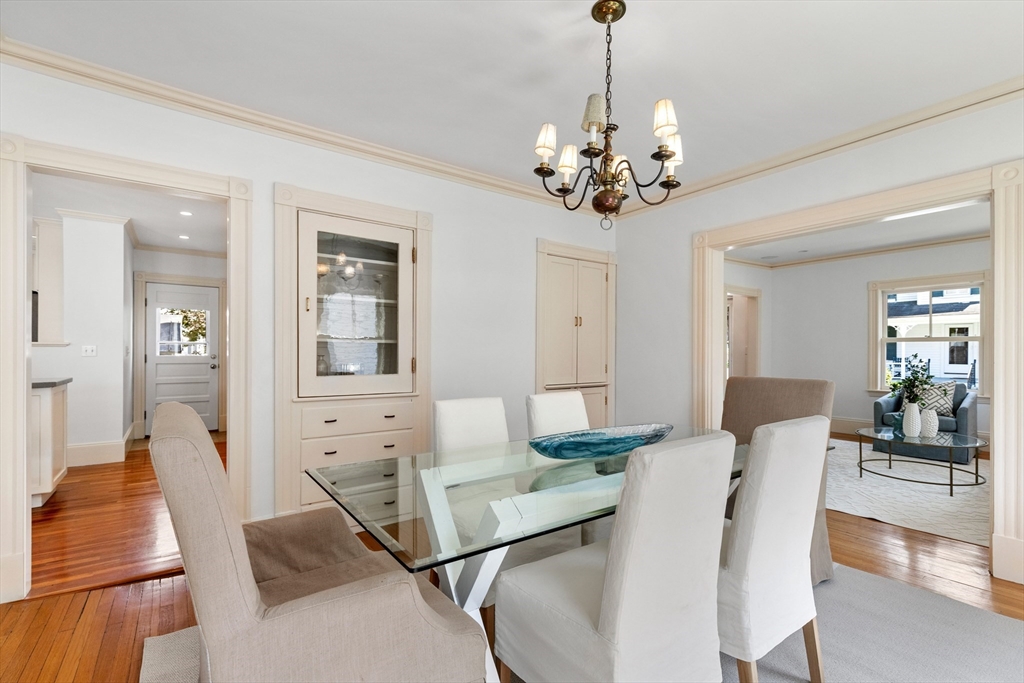 8 Jackson Court Lexington, MA 02421 - Photo 7 of 27 a view of a dining room with furniture and wooden floor