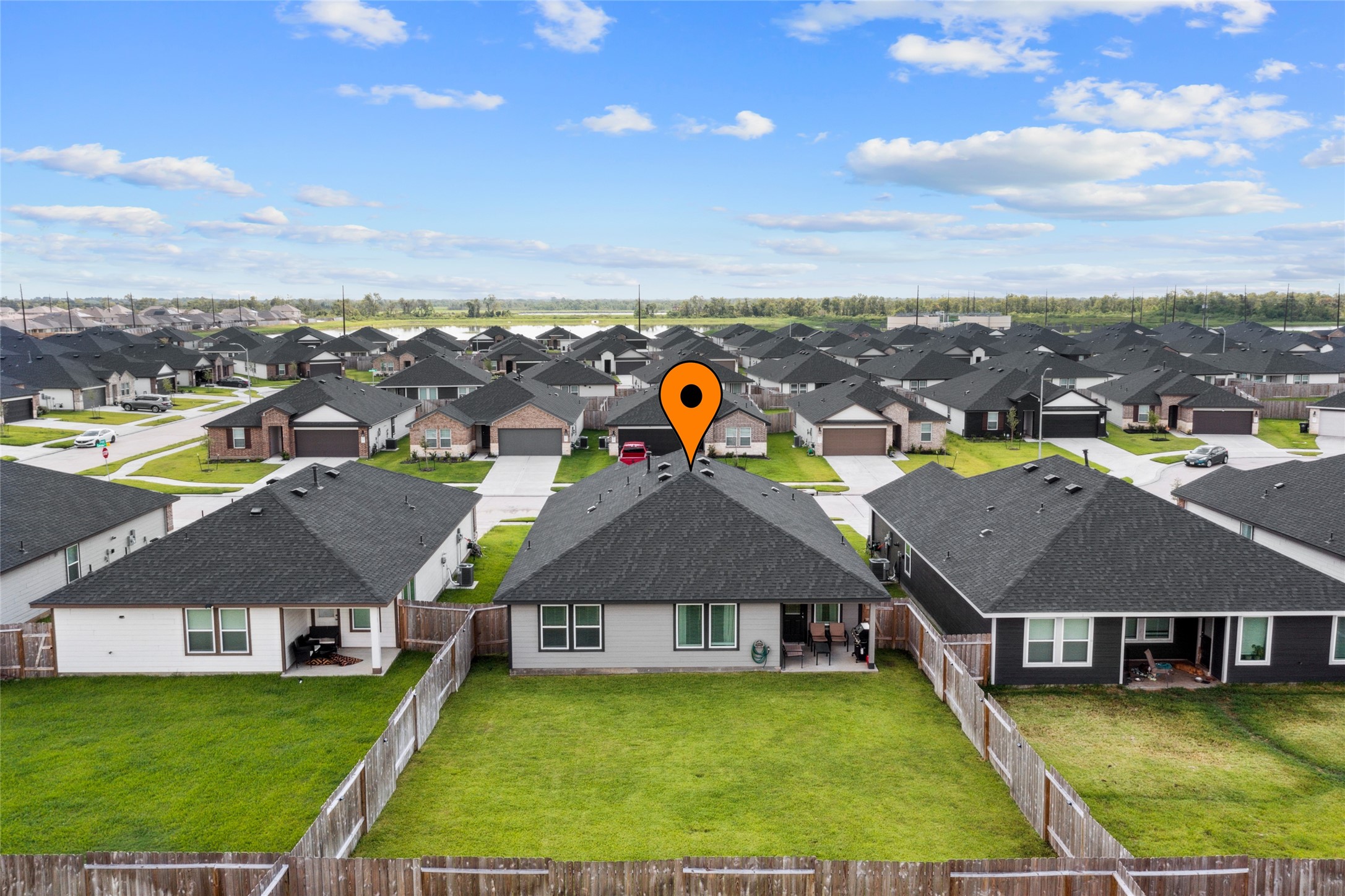 7510 Carson Court Rosharon, TX 77583 - Photo 19 of 23 an aerial view of residential houses with yard and ocean view