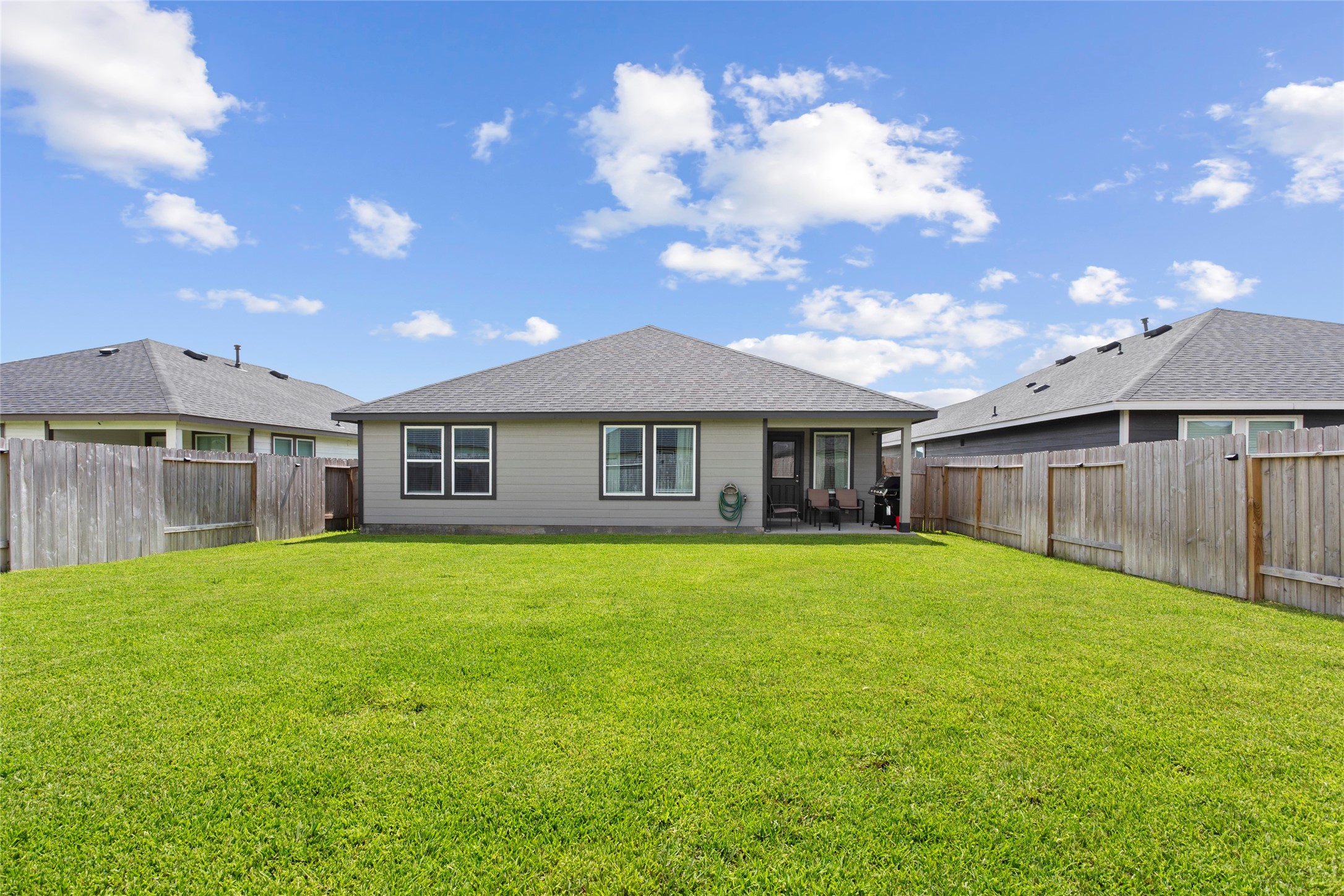 7510 Carson Court Rosharon, TX 77583 - Photo 20 of 23 a front view of a house with a garden