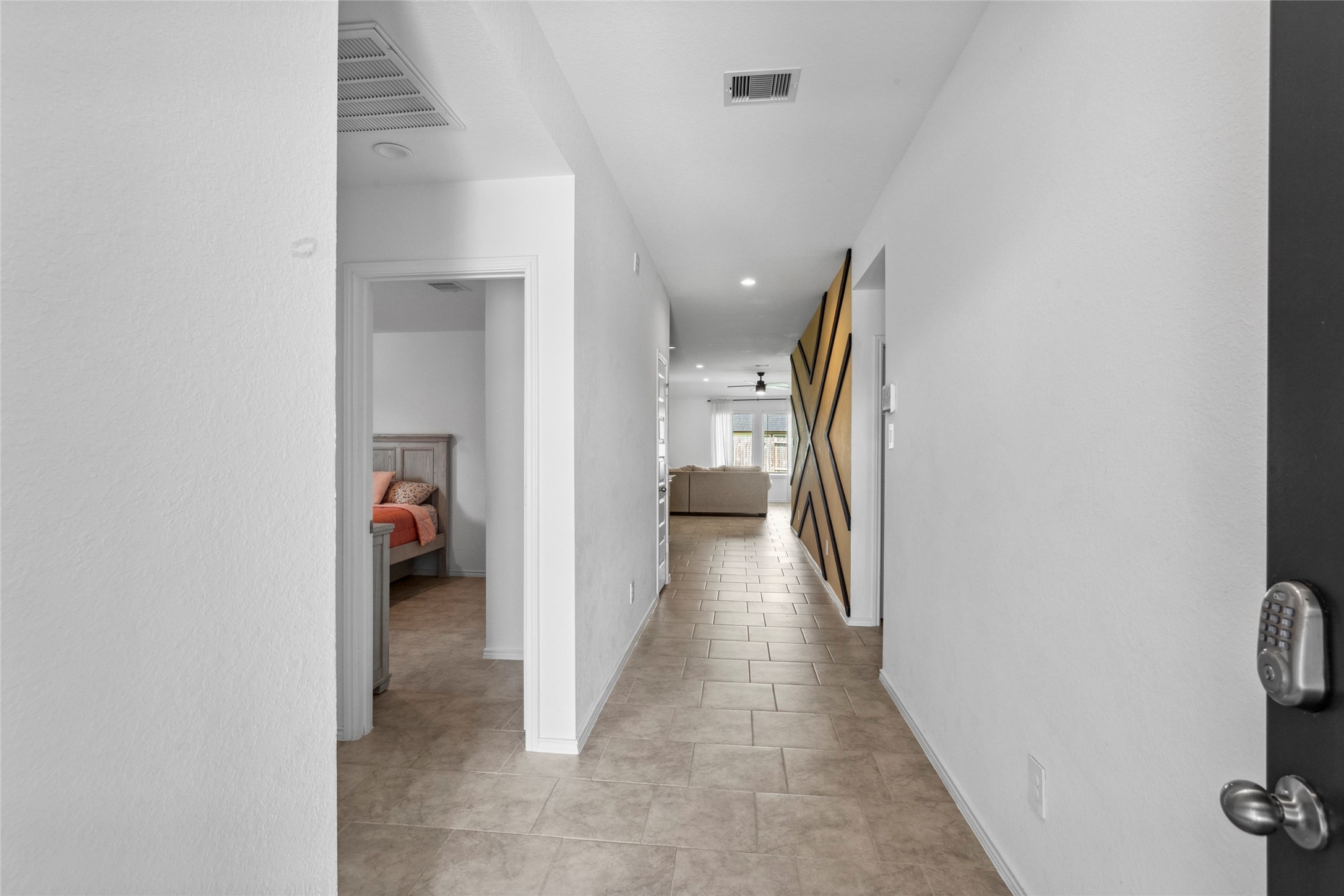 7510 Carson Court Rosharon, TX 77583 - Photo 2 of 23 a view of a hallway with closet and a bathroom