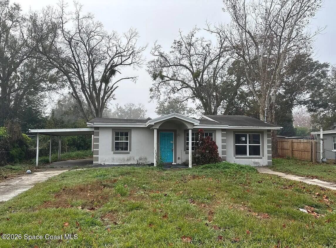 front view of house with a yard