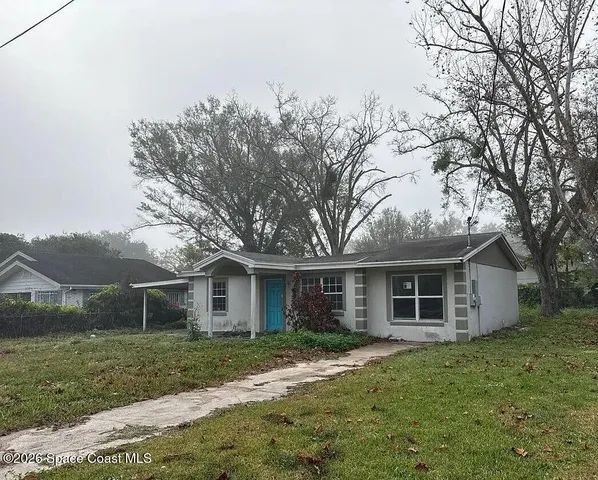 front view of a house and a yard