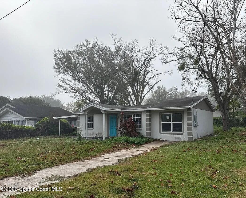 508 Oakland Road Auburndale, FL 33823 - Photo 2 of 5 front view of a house and a yard
