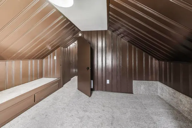 a bathroom with a sink toilet a mirror and shower