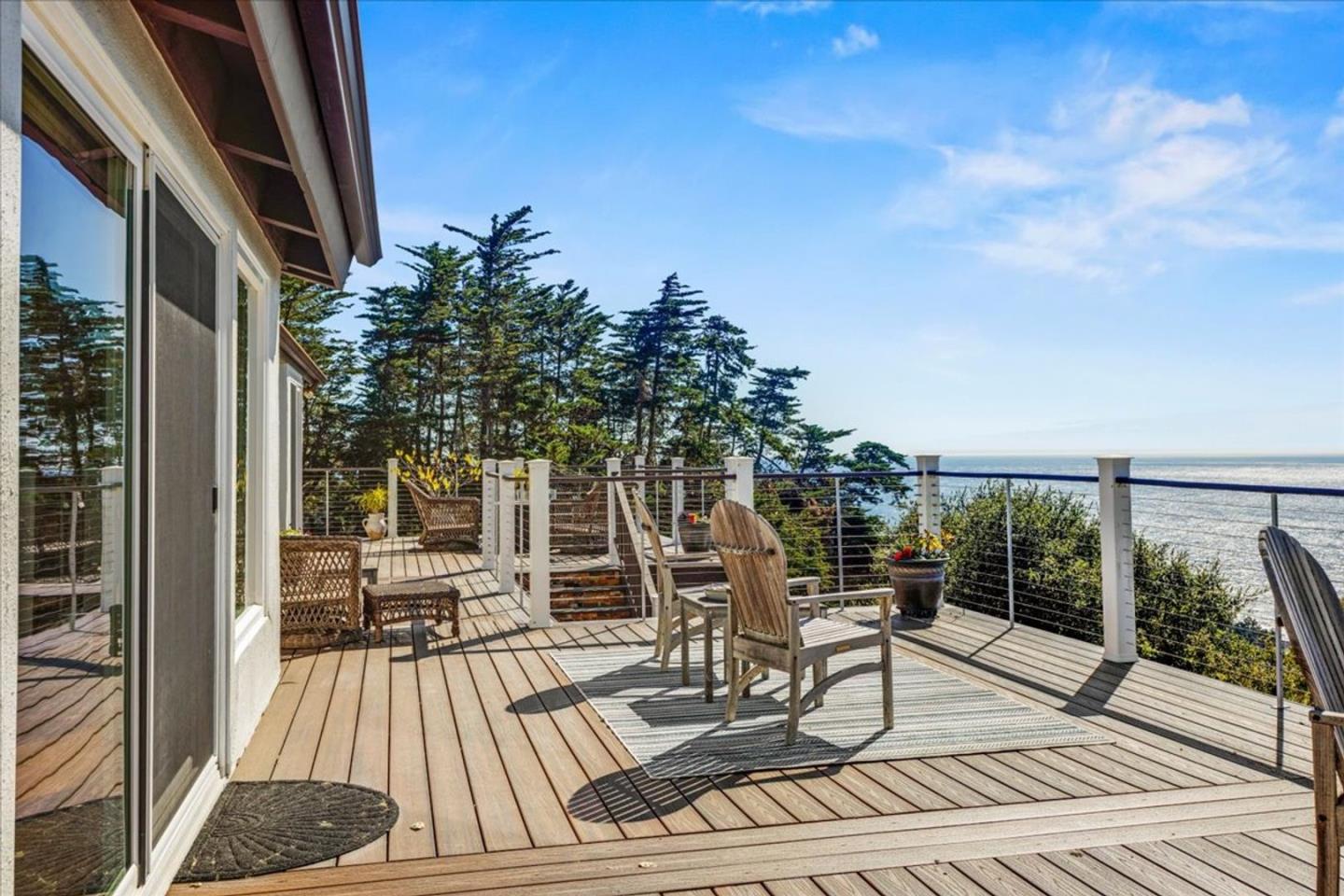 15 Mentone Road Carmel, CA 93923 - Photo 38 of 47 a view of balcony with wooden floor and outdoor seating