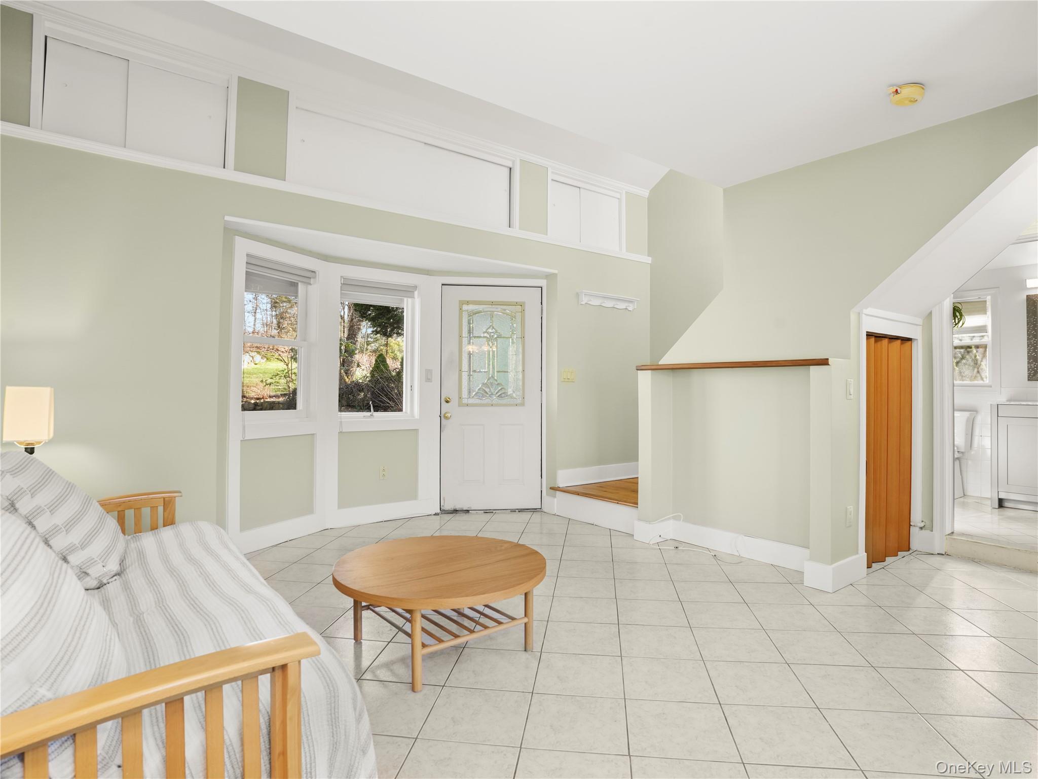 290 Salem Road Pound Ridge, NY 10576 - Photo 12 of 21 a living room with furniture and a table