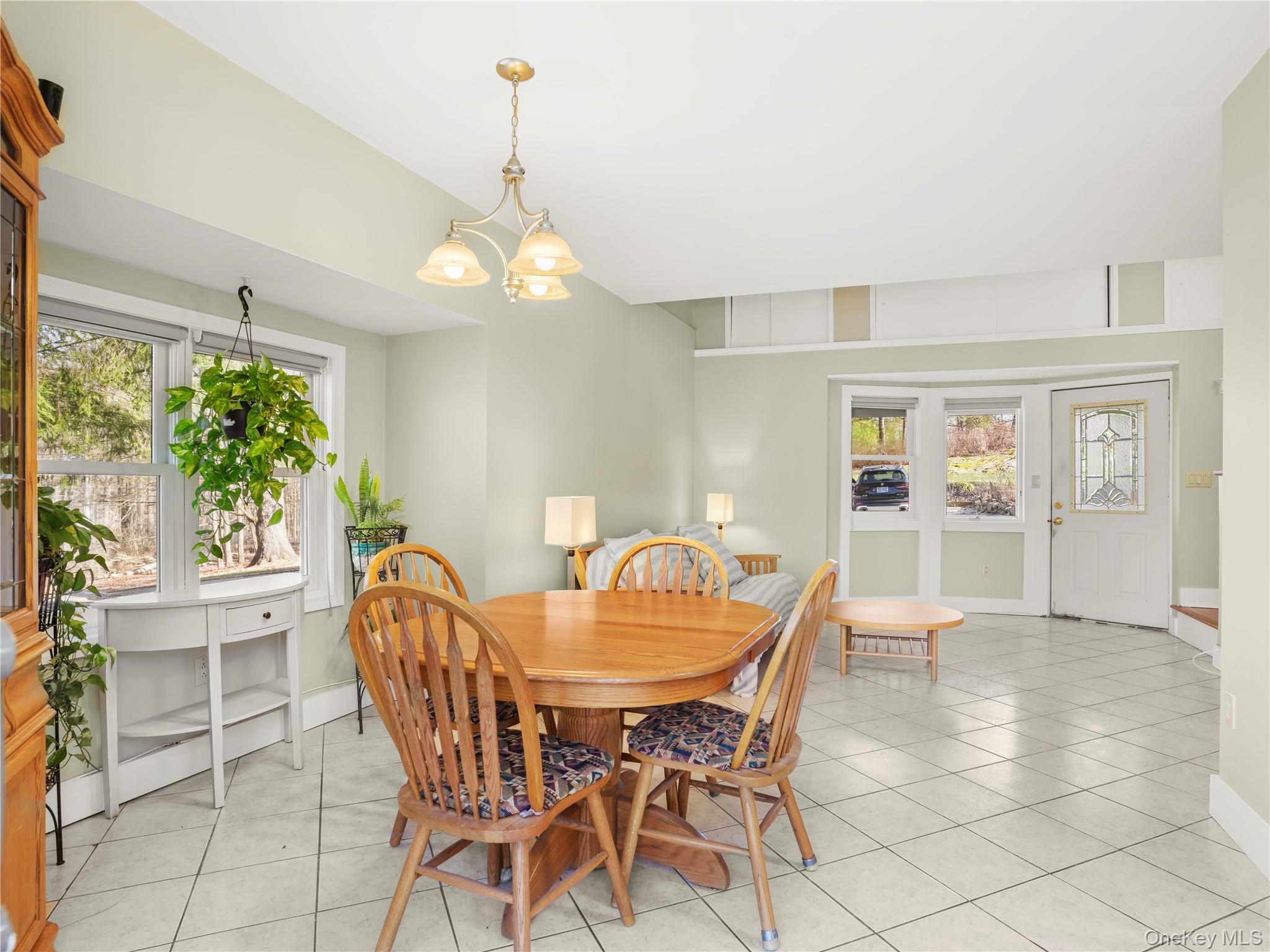 290 Salem Road Pound Ridge, NY 10576 - Photo 14 of 21 a dining room with furniture and window