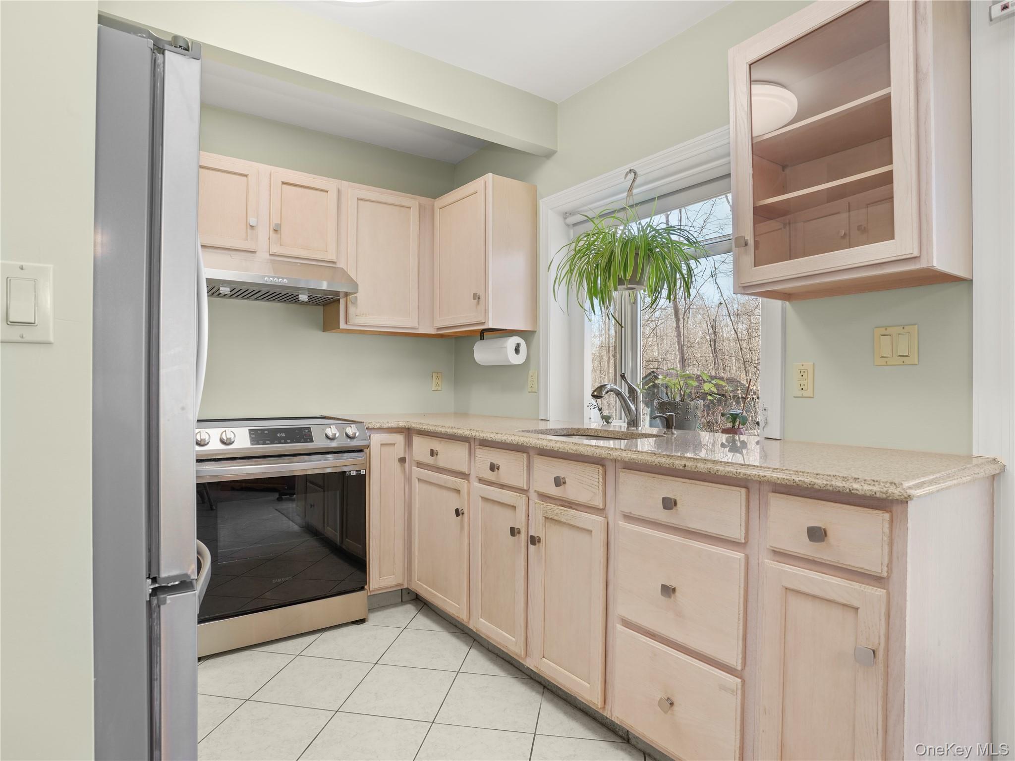 290 Salem Road Pound Ridge, NY 10576 - Photo 10 of 21 a kitchen with white cabinets and appliances