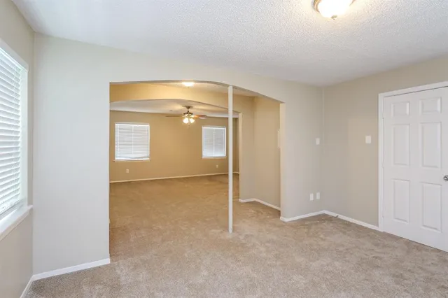 an empty room with windows