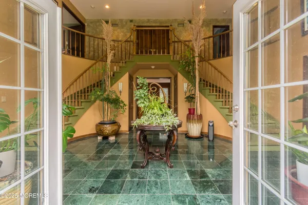 a view of balcony with furniture