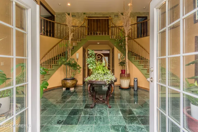a view of balcony with furniture