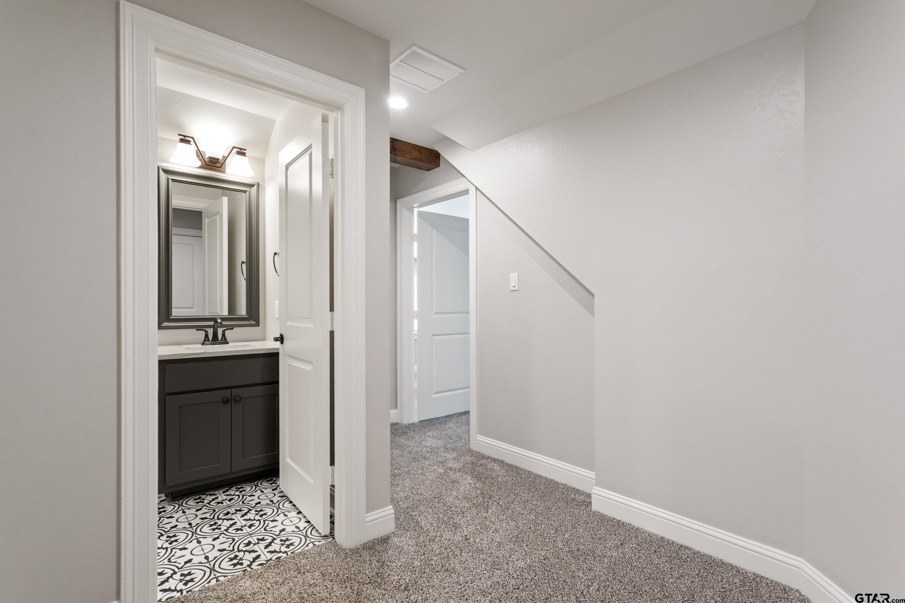 105 Nathan Road Chandler, TX 75758 - Photo 26 of 36 a view of a hallway view with staircase