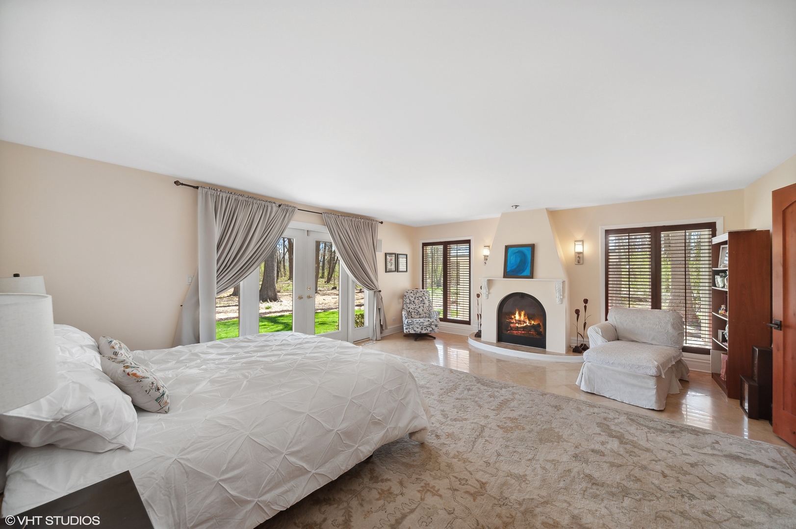 1685 Millburne Road Lake Forest, IL 60045 - Photo 6 of 21 a large bedroom with a bed and a large window