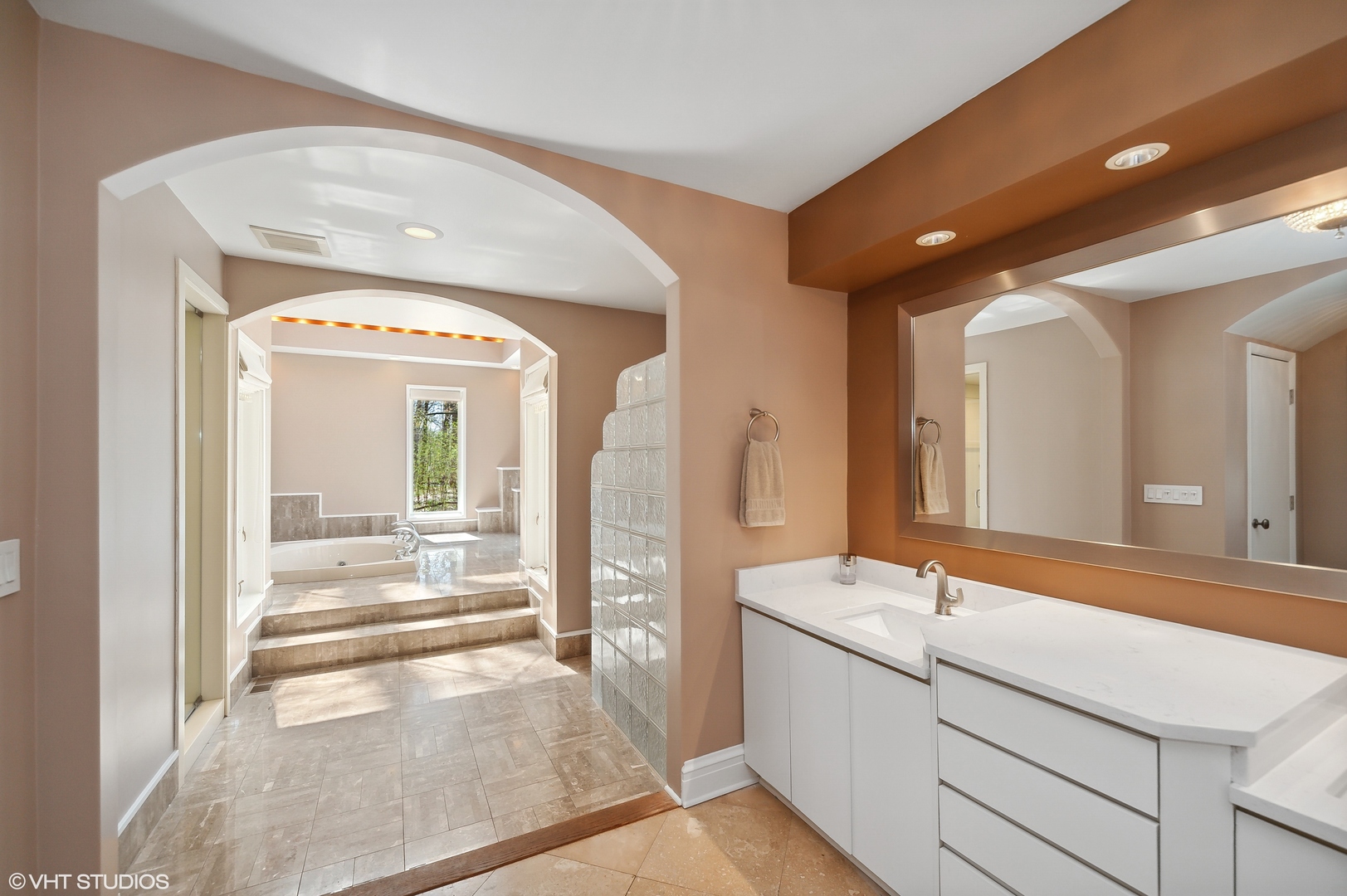 1685 Millburne Road Lake Forest, IL 60045 - Photo 7 of 21 a spacious bathroom with a double vanity sink and a mirror