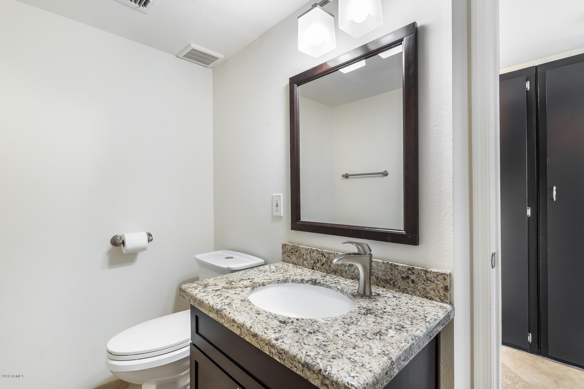 8236 East Chaparral Road Scottsdale, AZ 85250 - Photo 13 of 38 GUEST BATHROOM DOWNSTAIRS