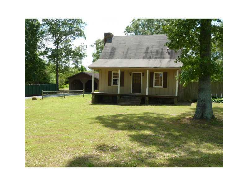 Exterior Front. Lovely rustic 1.5 story cottage; beautiful setting.